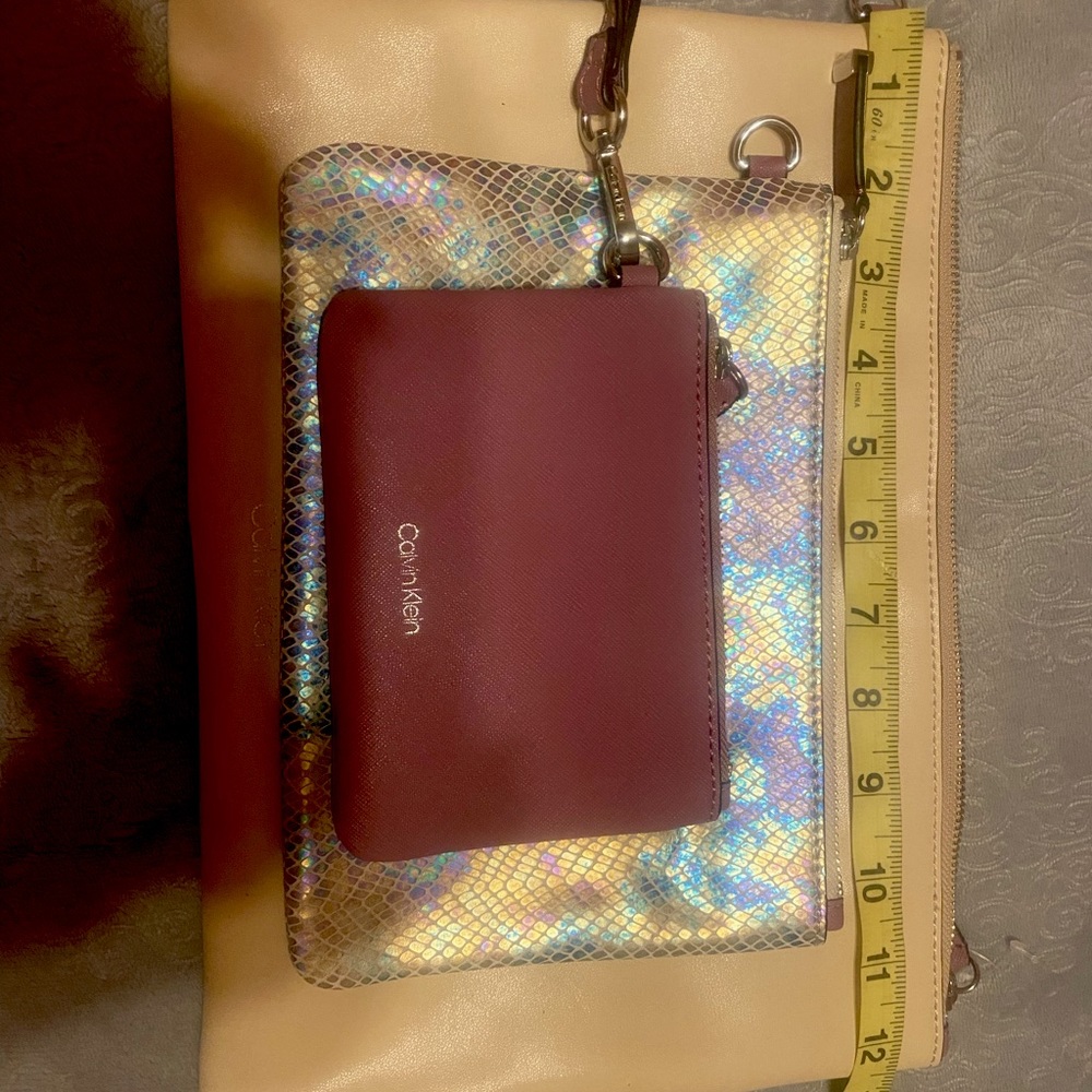 Calvin Klein  1 set of - 3 sizes of clutch hand bag. Pink/ beige